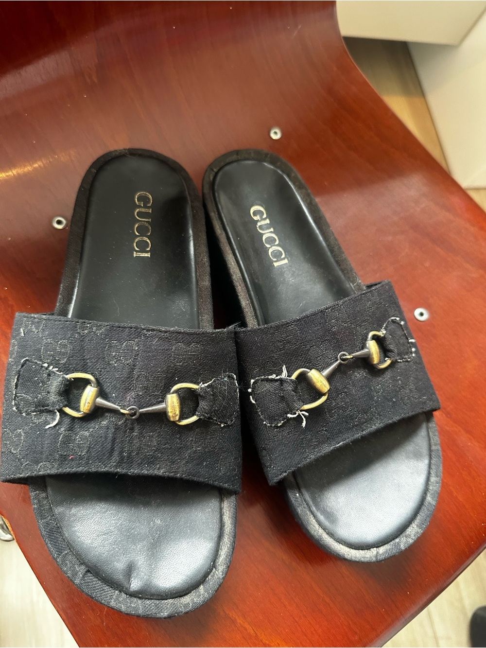 Gucci Black Canvas Horsebit Slide Mules with Gold Hardware. Fits sizes 8-9.